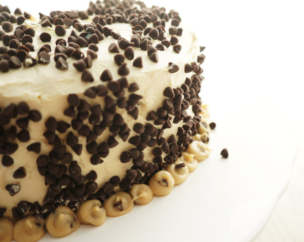 Vanilla cake filled with cookie dough covered in chocolate chips